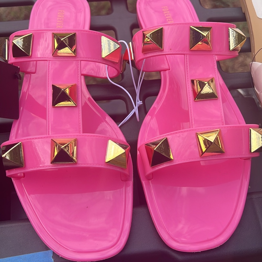 Hot pink jelly sandals with studs
